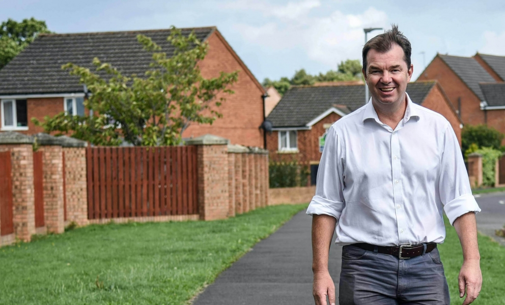 Guy Opperman standing on a street in the Hexham Parliamentary Constituency